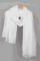 White linen Color-POP scarf hanging on wooden hanger, lightweight and warm eco-friendly fabric
