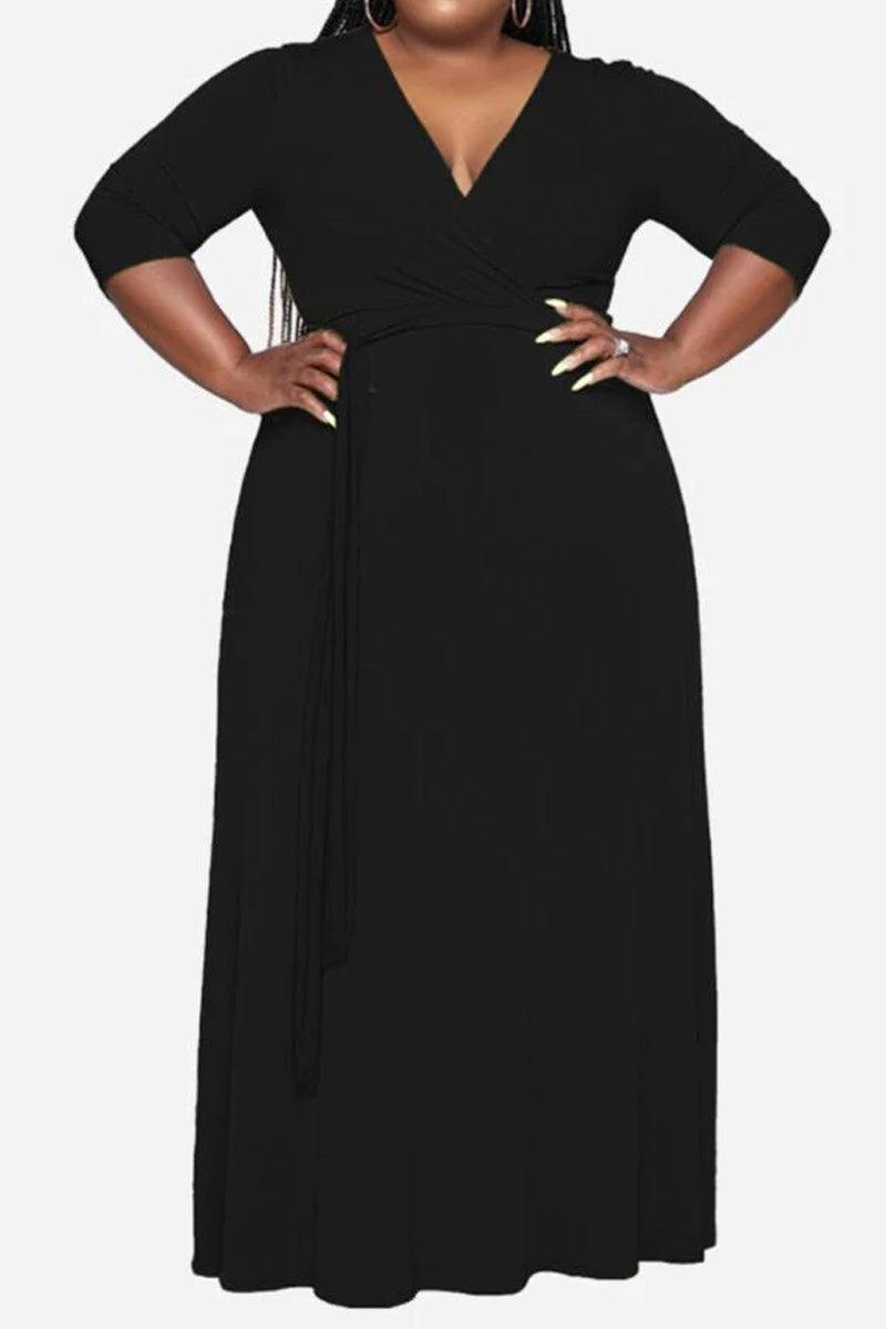 Elegant plus size black belted dress with deep V-neck and 3/4 sleeves