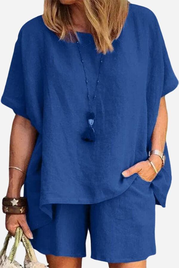 Comfy linen-like shirt and shorts two-piece set in blue, lightweight breathable fabric for casual and versatile style.