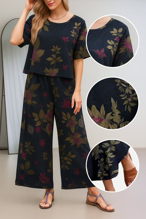 Women's loose fit co-ord set with floral print, soft-tailored top, and wide-leg bottoms in breathable fabric