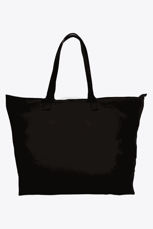 Black waterproof travel bag with sturdy handles and spacious design for versatile packing