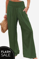 woman wearing high-waist polyester palazzo pants with pockets in casual setting