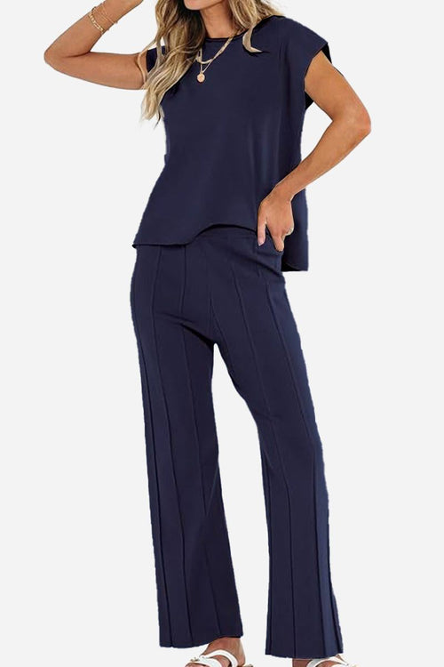 First Class Travel two-piece navy set with pleated wide-leg pants and relaxed top for travel comfort
