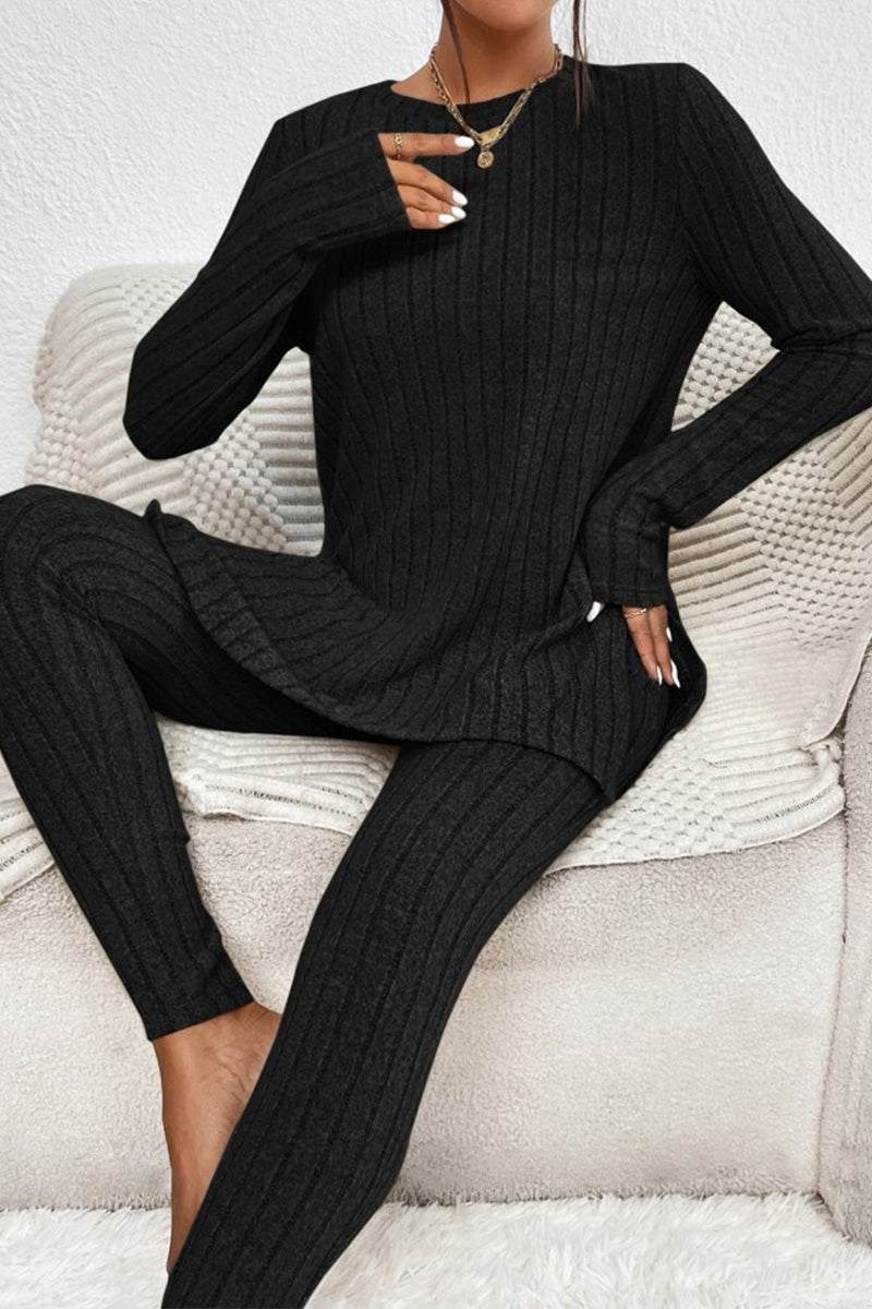 Black Butter Touch Ribbed Two-Piece Set with stretchy, ribbed fabric, consisting of long-sleeve top and fitted pants for comfortable, stylish wear.