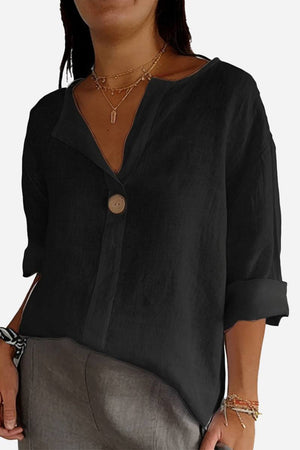 Black pure linen age-defying shirt with button detail and relaxed fit for breathable comfort