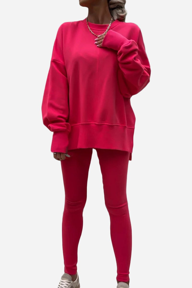 Woman wearing TimelessChic Ultra Comfortable Two-Piece Set in vibrant pink with relaxed top and high-waisted leggings.