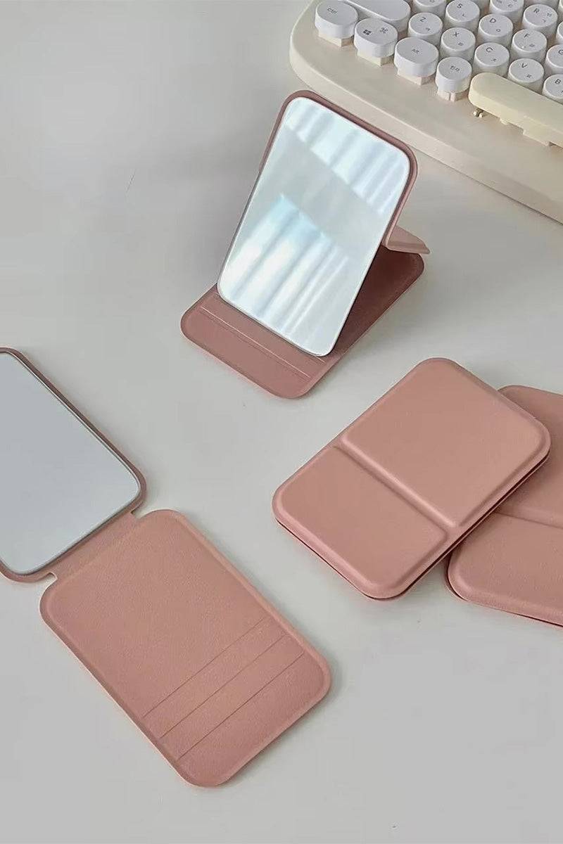 Compact travel pocket mirror with durable PU leather case in pink, lightweight and portable for on-the-go touch-ups.