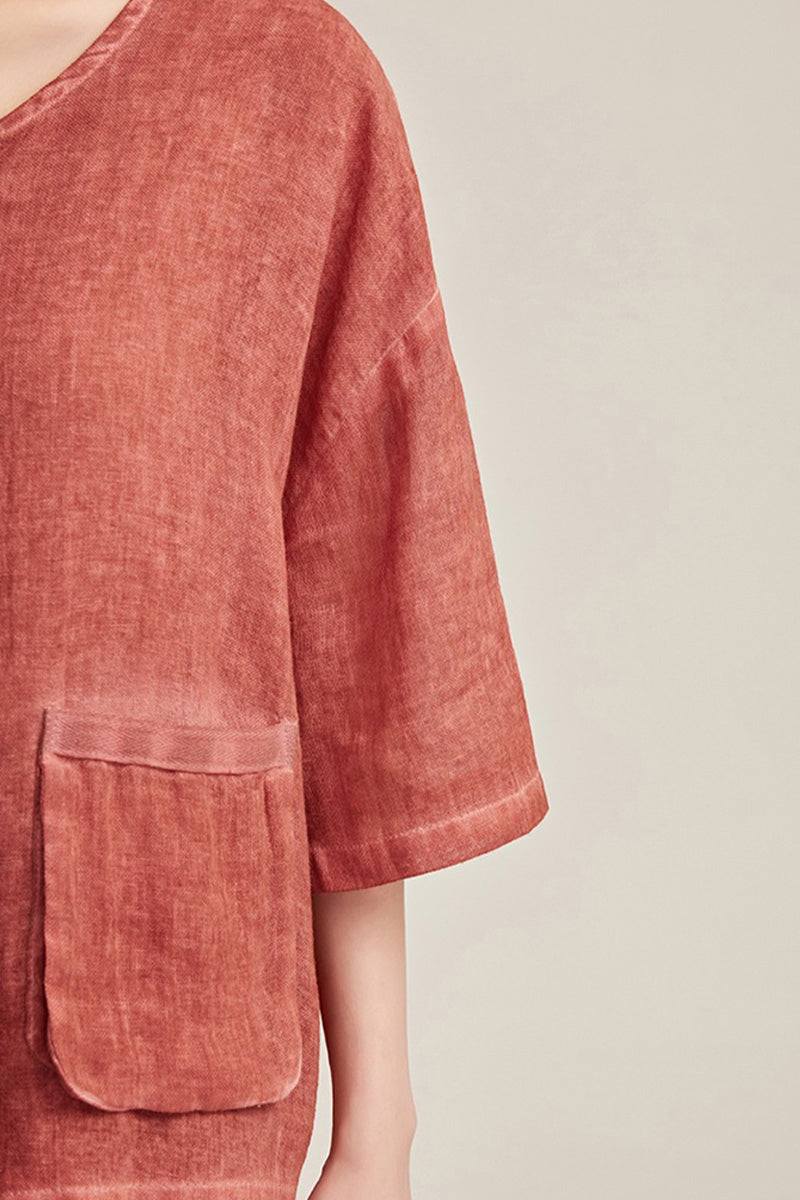 100% linen stone-washed relaxed button-up top with double pockets in muted sunset tone