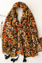 Twilight Blooms Scarf with warm floral print, lightweight polyester fabric, and tassel edges for elegant fall style