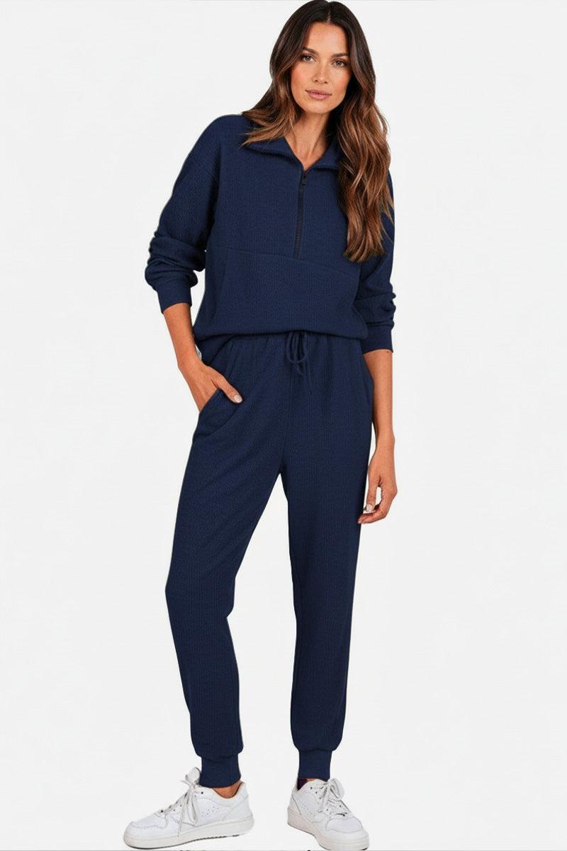 Unisex half-zip pullover and sweatpants set in navy blue, lightweight polyester blend for casual comfort and style