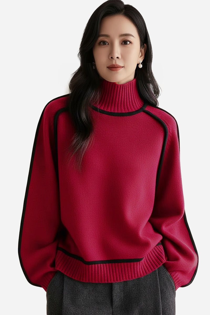 Woman wearing a red Zero Itch Turtleneck Sweater with black slimming contrast trim and relaxed fit.