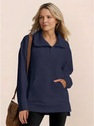 Half-zip waffle pullover with fold-over collar and kangaroo pocket, cozy polyester knit for casual wear