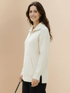 Half-zip waffle pullover with fold-over collar and kangaroo pocket, cozy textured knit ideal for casual wear