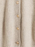 Oversized button-front knit cardigan with balloon sleeves and gold-tone buttons