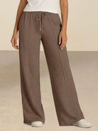 Soft knit wide-leg pants with elastic drawstring waist and side pockets