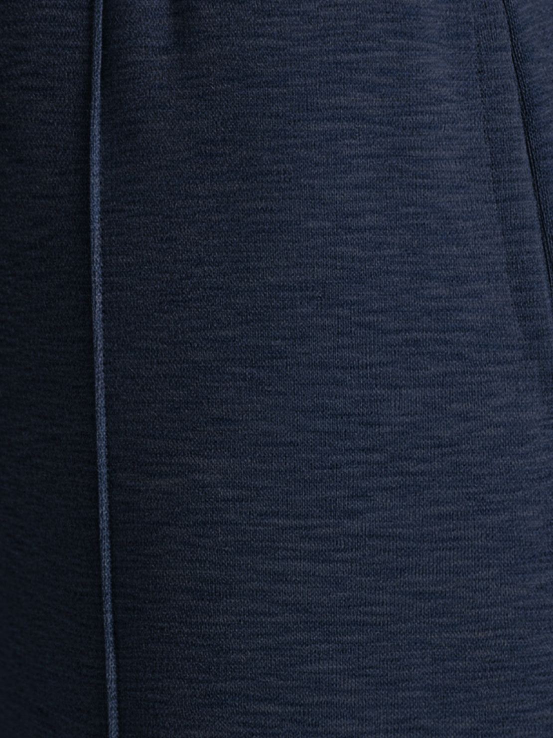 Soft knit wide-leg pants with breathable fabric, elastic drawstring waist, and side pockets for a relaxed everyday fit