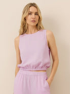 Lightweight linen-blend sleeveless top and wide-leg pants set with elastic waistband and side slits for breathable comfort