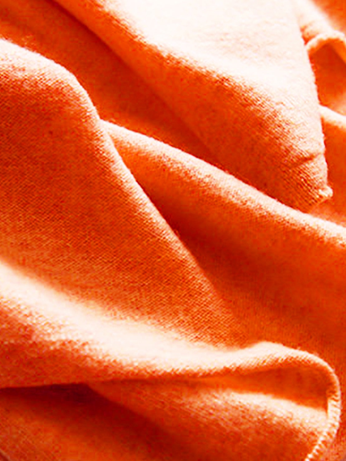 Long Australian Merino Wool cardigan with open-front, ribbed cuffs, and front pockets for versatile layering