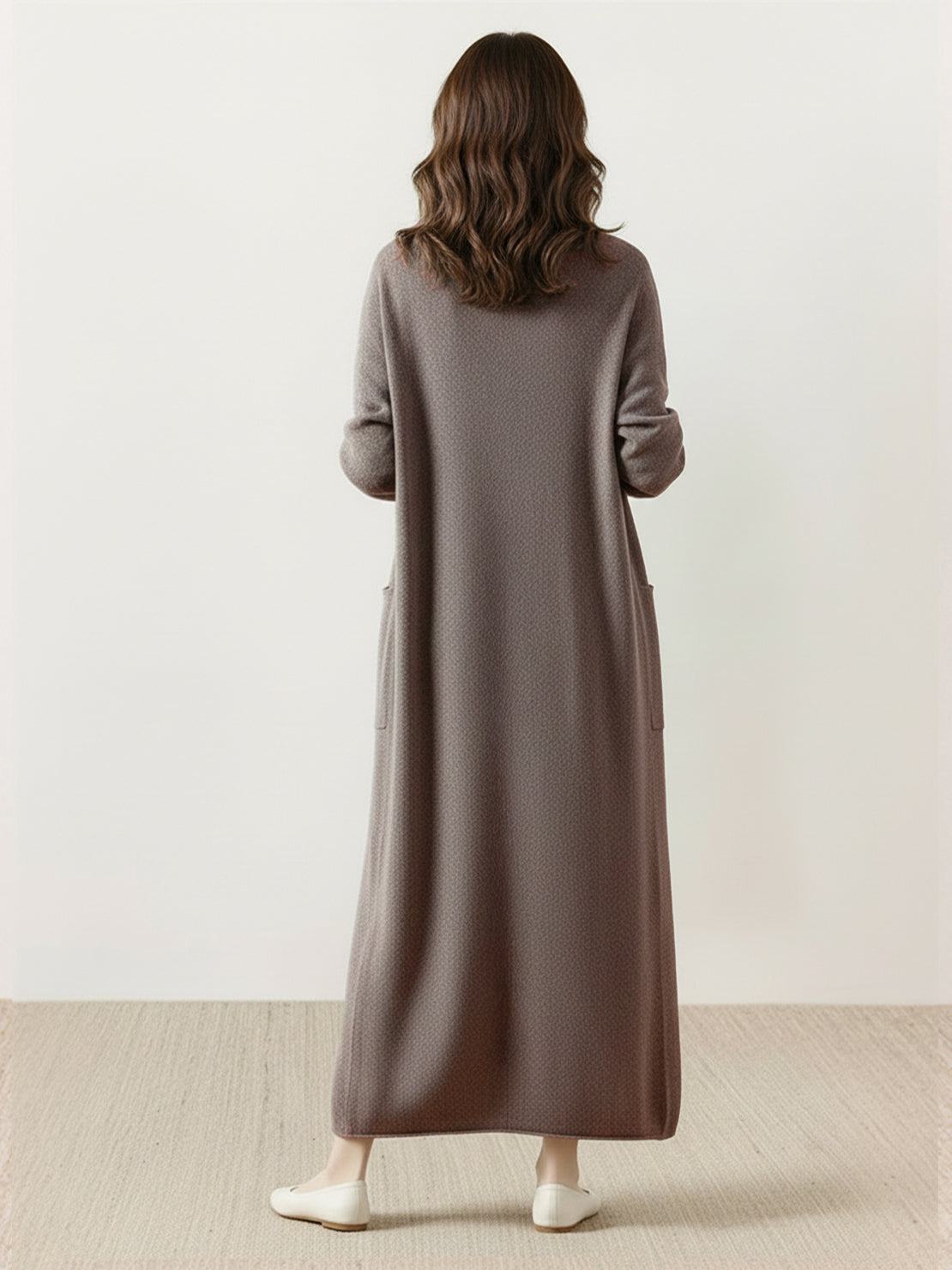 100% Australian Merino Wool longline open-front cardigan with patch pockets and ribbed cuffs