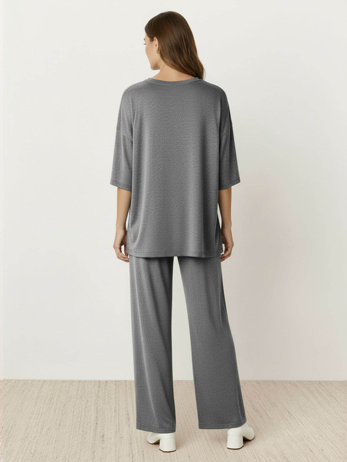 Oversized long-line loungewear set with short-sleeve pullover and wide-leg pants in soft knit fabric
