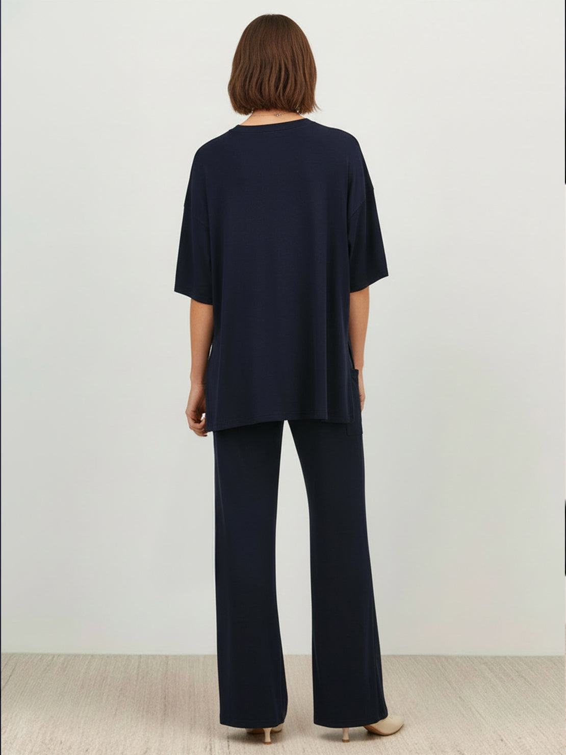 Oversized long-line loungewear set with short-sleeve pullover and straight-leg pants in soft knit fabric