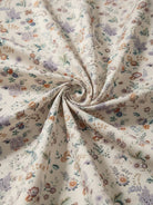 floral button-down shirt with long roll-up sleeves and hip-length relaxed fit