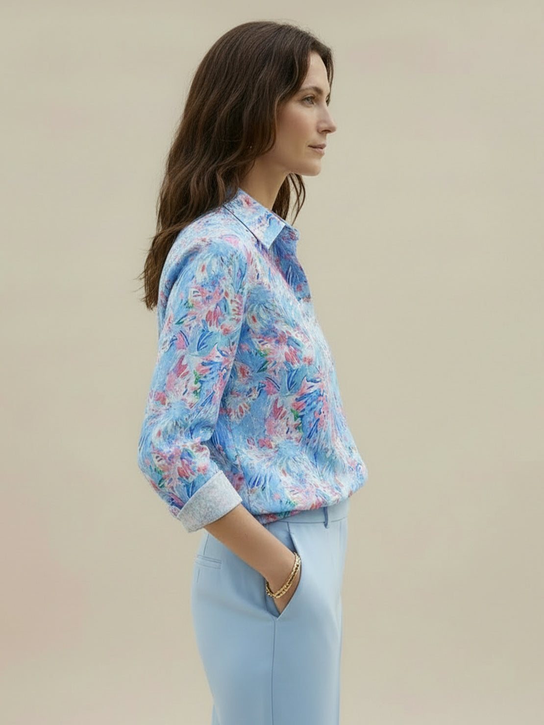 Floral button-down shirt with long roll-up sleeves and hip-length relaxed fit