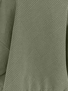 Cropped textured baseball jacket with full zipper and elastic cuffs, perfect for casual layering and pairing with high-waisted bottoms