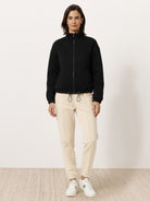 Textured cropped baseball jacket with full-zip, stand collar, elastic cuffs and waistband, perfect casual layering piece