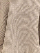 Cropped textured baseball jacket with full zipper, stand collar, elastic cuffs, and waistband.