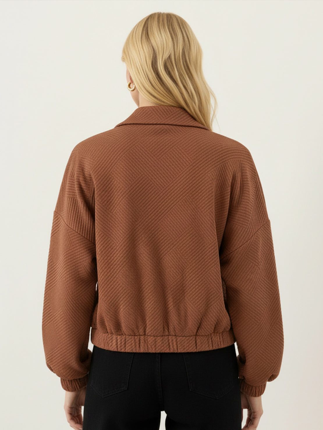 Cropped textured baseball jacket with full zipper, elastic cuffs, and waistband in relaxed fit