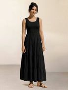 Smocked sleeveless maxi dress with tiered skirt and scoop neckline in lightweight fabric