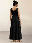 Smocked sleeveless maxi dress with tiered skirt and scoop neckline in lightweight fabric