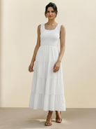 Smocked sleeveless maxi dress with tiered skirt and scoop neckline in lightweight fabric