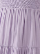 Smocked sleeveless maxi dress with tiered skirt and breathable fabric