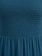 Smocked sleeveless maxi dress with tiered skirt and scoop neckline in lightweight fabric