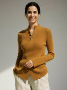 Asymmetric wrap ribbed knit top with diagonal button closure and flared cuffs in slim fit