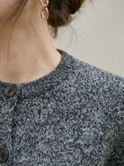 Chunky marled knit merino wool cardigan with button front and ribbed cuffs and hem