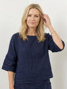 Two-piece 100% cotton wrap skirt and hip-length top set with crinkle texture and deep pockets