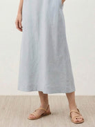 Lightweight 100% cotton linen sleeveless maxi dress with round neckline and flowing ankle-length silhouette