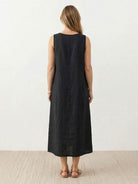 Lightweight cotton linen sleeveless maxi dress with round neckline and flowy ankle-length silhouette