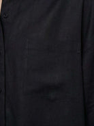 Lightweight 100% cotton-linen oversized shirt with dropped shoulders and curved hem
