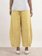100% linen harem balloon pants with elastic waistband and drawstring in light beige linen fabric