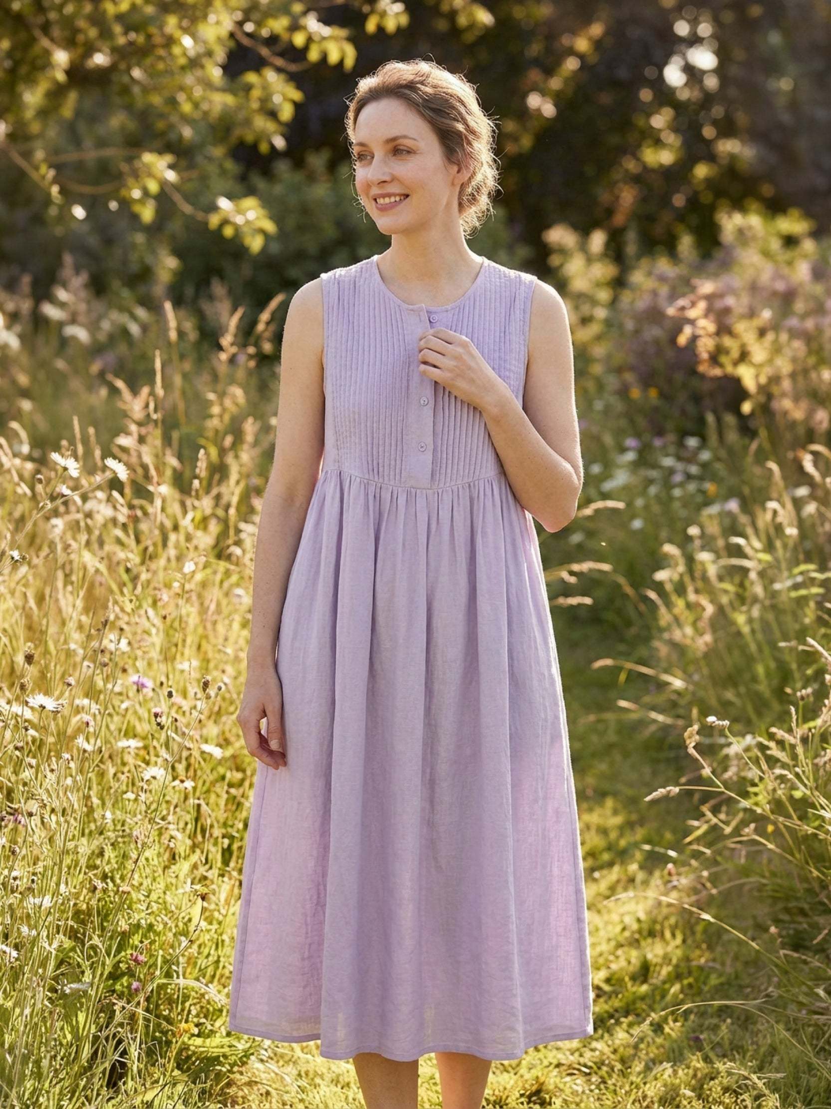 Sleeveless cotton linen pleated midi dress with pintuck bodice and full A-line calf-length skirt