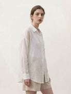 Lightweight 100% linen sheer overshirt with oversized fit and button front