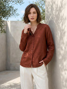 Lightweight 100% linen V-neck shirt with relaxed fit and long sleeves