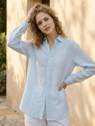 Loose fit 100% linen pinstripe shirt with drop shoulders and curved hem