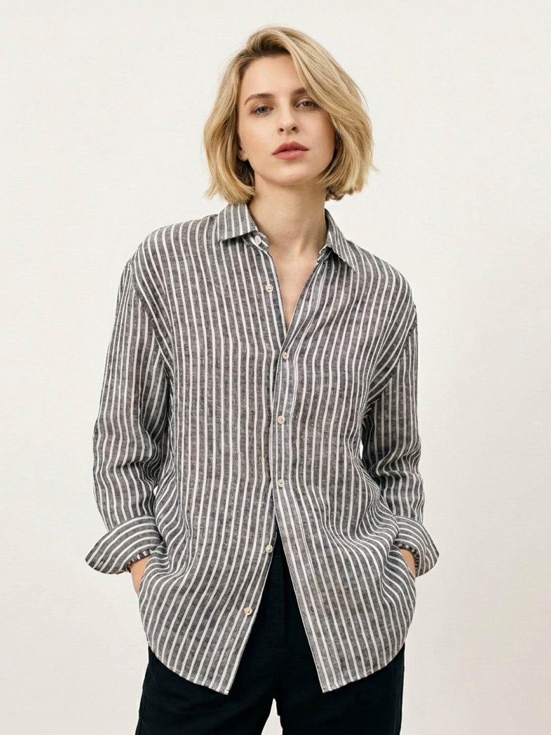 Women's 100% linen pinstripe shirt with loose fit, drop shoulders, and curved hem