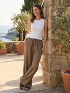 100% linen wide-leg pants with high-rise elastic waist and front drawstring tie