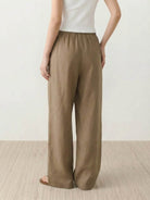 100% linen wide-leg pants with high-rise elastic waist and side pockets